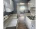 Functional kitchen design with plenty of countertop space, classic cabinets, and modern appliances at 9432 84Th St, Seminole, FL 33777