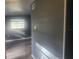 Inviting living area with natural light filtering through the window, and neutral walls at 9432 84Th St, Seminole, FL 33777