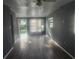 Spacious living room with vinyl floors and natural light, providing a bright and inviting space at 9432 84Th St, Seminole, FL 33777