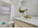 Cozy bathroom with a shower-tub combo and classic yellow decor at 10093 Holly Berry Dr, Weeki Wachee, FL 34613