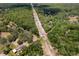 Aerial view of power lines through a forest at 10149 Rockbay Rd, Brooksville, FL 34601