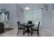 Breakfast nook with ceramic tile, natural light, and contemporary furnishings at 10149 Rockbay Rd, Brooksville, FL 34601
