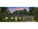Charming single-story home with well-lit windows and manicured landscaping at dusk at 10149 Rockbay Rd, Brooksville, FL 34601