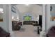 Spacious living room with vaulted ceilings, neutral colors, and a comfortable seating arrangement at 10149 Rockbay Rd, Brooksville, FL 34601
