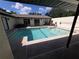 Inviting pool offers a refreshing retreat, perfect for relaxation and recreation at 10244 Hoover St, Spring Hill, FL 34608