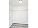 Walk in closet with wire shelving and grey flooring at 10386 Norvell Rd, Spring Hill, FL 34608