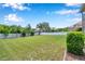 Large green backyard with privacy fence at 11726 Belle Haven Dr, New Port Richey, FL 34654