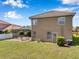 Two story home with screened lanai and lush lawn at 11726 Belle Haven Dr, New Port Richey, FL 34654