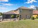 Beautiful backyard featuring a screened lanai at 11726 Belle Haven Dr, New Port Richey, FL 34654