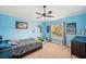 Blue ' bedroom with Minecraft and Pokemon-themed decor and ample natural light at 11726 Belle Haven Dr, New Port Richey, FL 34654
