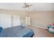 Neutral bedroom featuring two closets, carpet, and decor at 11726 Belle Haven Dr, New Port Richey, FL 34654