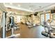 Well-equipped gym with cardio machines and weight training equipment, promoting a healthy lifestyle at 11726 Belle Haven Dr, New Port Richey, FL 34654
