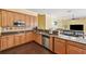 Well-equipped kitchen features stainless steel appliances and ample counter space at 11726 Belle Haven Dr, New Port Richey, FL 34654