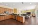 Stylish kitchen with stainless appliances seamlessly flows into the dining and living areas at 11726 Belle Haven Dr, New Port Richey, FL 34654