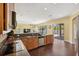 Bright kitchen featuring stainless steel appliances and views of the outdoor patio at 11726 Belle Haven Dr, New Port Richey, FL 34654