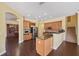 Modern kitchen with stainless steel appliances and a functional center island at 11726 Belle Haven Dr, New Port Richey, FL 34654