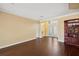 Bright and spacious living room featuring beautiful tile floors, and a bookcase at 11726 Belle Haven Dr, New Port Richey, FL 34654