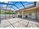 Wide shot of an enclosed patio with brick flooring and provides a private outdoor living space at 11726 Belle Haven Dr, New Port Richey, FL 34654