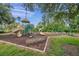 Fun playground area with slides, swings, and climbing structures, perfect for outdoor activities at 11726 Belle Haven Dr, New Port Richey, FL 34654