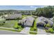 Spacious home with a large yard, well-kept lawn, and proximity to a pond at 12027 Yellow Finch Ln, Trinity, FL 34655