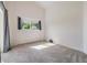 Spacious bedroom with a large window with natural light, carpet flooring at 12027 Yellow Finch Ln, Trinity, FL 34655