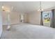 Open living room featuring high ceilings, and plenty of natural light at 12027 Yellow Finch Ln, Trinity, FL 34655
