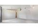 Open Living Room with neutral color palette and dining area at 12027 Yellow Finch Ln, Trinity, FL 34655
