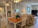Inviting dining area with a wooden table and chairs, next to the living room at 1243 S Martin Luther King Jr Ave # C505, Clearwater, FL 33756