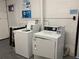Laundry room featuring a washing machine and a dryer at 1243 S Martin Luther King Jr Ave # C505, Clearwater, FL 33756