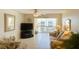 Bright living room with a large window and comfortable seating area at 1243 S Martin Luther King Jr Ave # C505, Clearwater, FL 33756