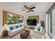 Comfortable living room, with lots of light and plush furnishings at 13001 Sawmill Way, Hudson, FL 34667
