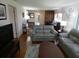 Spacious living room with hardwood floors, lots of light, and comfortable seating at 13010 Wedgewood Way # A, Hudson, FL 34667