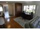 Dedicated home office space with a built-in desk, window, and hardwood floors at 13010 Wedgewood Way # A, Hudson, FL 34667
