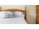 Comfortable bedroom featuring a decorative bed with a wooden headboard and coordinating dresser at 13444 English Parrot Rd, Brooksville, FL 34614