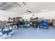 Spacious garage filled with tools and equipment, offering ample storage and workspace for various projects and hobbies at 13444 English Parrot Rd, Brooksville, FL 34614