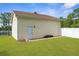 Exterior of the garage with a door leading to the backyard at 13444 English Parrot Rd, Brooksville, FL 34614