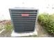 Goodman A/C unit with surrounding greenery at 14112 Whitecap Ave, Hudson, FL 34667
