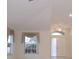 Bright foyer featuring tile flooring, high ceilings, and natural light at 14112 Whitecap Ave, Hudson, FL 34667