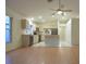 Open kitchen featuring a center island and stainless steel appliances at 14112 Whitecap Ave, Hudson, FL 34667