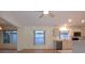 Open floorplan with kitchen featuring modern appliances and light cabinetry at 14112 Whitecap Ave, Hudson, FL 34667