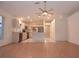 Well-lit kitchen with stainless appliances opens to the living area at 14112 Whitecap Ave, Hudson, FL 34667