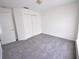 Comfortable bedroom features neutral walls, carpet flooring, and closet at 15160 Durango Cir, Brooksville, FL 34604