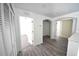 Hallway features wood floors, multiple doors, and lots of natural light at 15160 Durango Cir, Brooksville, FL 34604