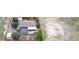 Aerial view of home's backyard showing the pool, shed and property lines of the home at 15287 Coot Rd, Weeki Wachee, FL 34614