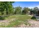 Large backyard featuring a fenced perimeter, perfect for outdoor activities and enjoying the serene natural surroundings at 15287 Coot Rd, Weeki Wachee, FL 34614