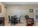 Dining area adjacent to the kitchen features a table, chairs, and natural light, perfect for casual Gathering meals at 15287 Coot Rd, Weeki Wachee, FL 34614