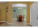 Inviting dining room with tile floors, wood table, and a chandelier at 15287 Coot Rd, Weeki Wachee, FL 34614