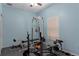 Home gym equipped with weightlifting equipment, offering a convenient space for exercise and fitness activities at 15287 Coot Rd, Weeki Wachee, FL 34614