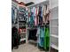 Walk-in closet featuring custom built-in shelving and ample storage space for clothing and accessories at 15287 Coot Rd, Weeki Wachee, FL 34614