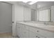 Bathroom with a double sink vanity and neutral accents at 15569 Burbank Dr, Brooksville, FL 34604